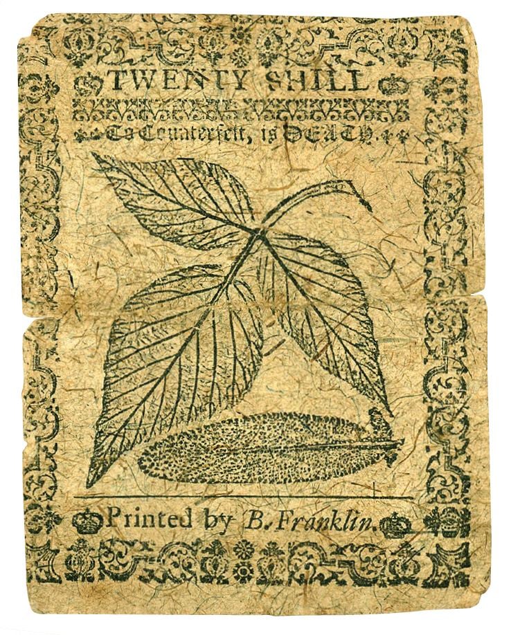 A 20-shilling Pennsylvania bill Franklin printed in 1739 includes anti-counterfeit measures he developed, including watermarks and blue threads, along with a warning: “To counterfeit is death.”