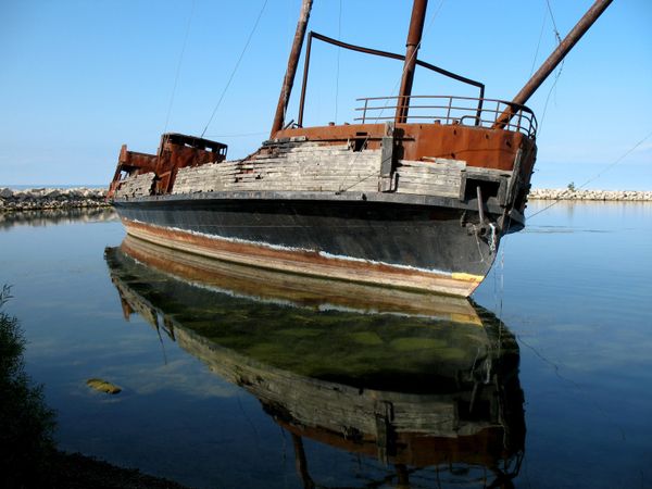 This boat, acting as a breakwater greets visitors traveling along the niagara peninsula. thumbnail
