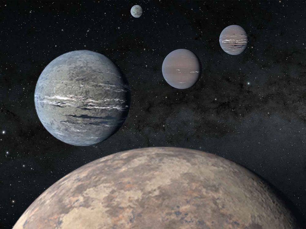 Five planets lined up in the night sky, from a large planet partially visible in foreground to four smaller sub-Neptune planets 