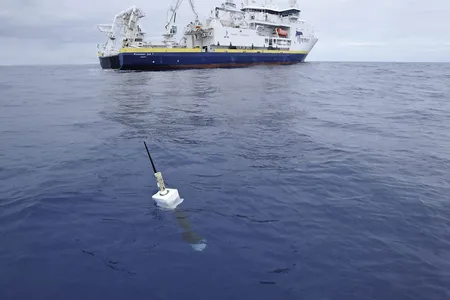 An Argo float, seen in the foreground, is a battery-powered device that automatically measures and transmits information about the environment. 