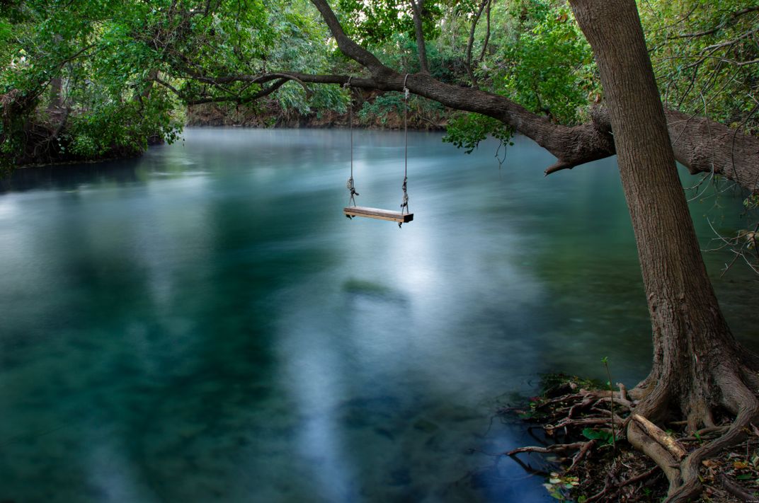 Empty Swing Over A Full River, Smithsonian Photo Contest