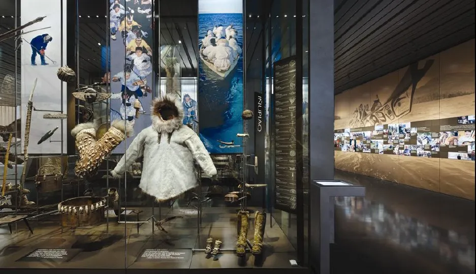 An exhibit display of indigenous clothing and accessories.