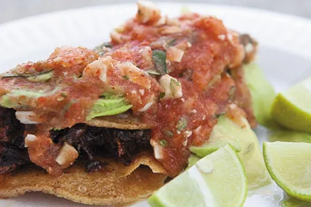 Raul Ortega makes his shrimp tacos, shown here, the same way he did when he lived in San Juan de los Lagos.