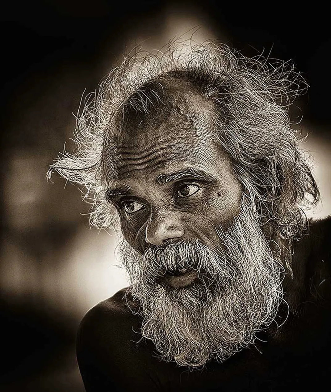 A man at temple. Nikon D3S, Nikon 70-200mm/F2.8, 1/1600s, ISO400, F2.8 |  Smithsonian Photo Contest | Smithsonian Magazine