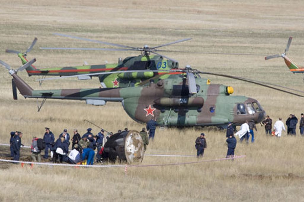 The crew of the space station returns to Earth safe, but off target.
