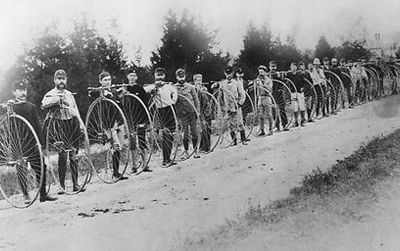 Balancing act: men and their big-wheeled ordinaries in one of the first bicycling touring clubs, in 1879 near Readville, Massachusetts.