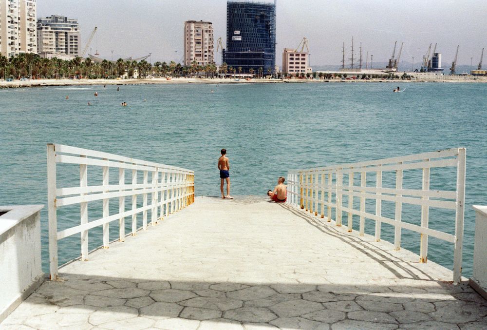 Durres, Albania roadtrip 2024. A beach day I will never forget. These young boys were jumping from the deck on the water non stop.