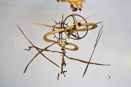 Suspended clock made from walnut, cherry wood, white oak and box elder 