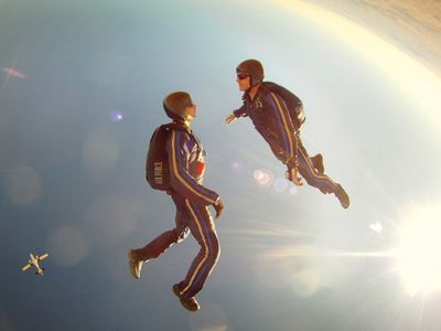 111103-F-UV830-901 U.S. Air Force Academy cadets with the Air Force Wings of Blue Parachute Competition Team perform at the U.S. Parachuting Association's national championships in Eloy, Ariz., on Nov. 3, 2011.  The "Air Force Intrepid" competition team took first place in the four-person intermediate free-flying event.  DoD photo by the U.S. Air Force.  (Released)