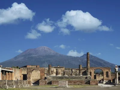 The ruins of Pompeii with Mount Vesuvius in the background. The city was destroyed during an infamous volcanic eruption in 79 C.E., and new research suggests an earthquake may have contributed to the damage and death toll.