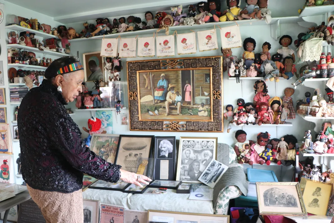 Elizabeth Meaders shows off some of the objects in her collection