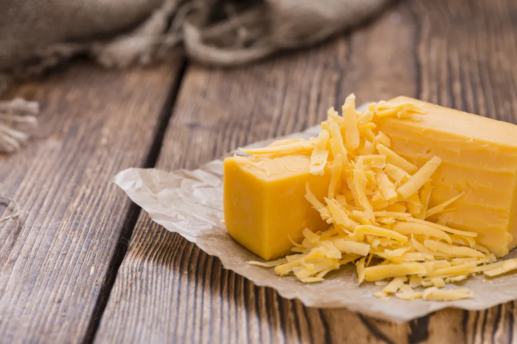 Shredded cheddar off a block of cheese