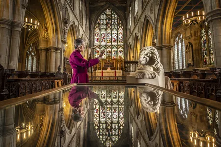 Bishop of Hull Alison White blesses a statue of Aslan, a character from C.S. Lewis' The Chronicles of Narnia, at St. Mary’s Church in Beverley, East Yorkshire.