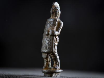This tiny Roman gladiator figurine used to be the handle on a folding knife.
