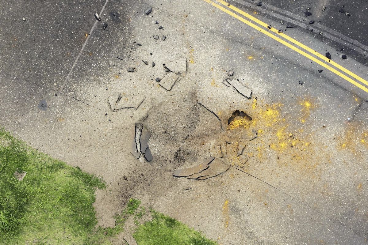 An American Bomb Left Over From World War II Explodes at an Airport Taxiway in Japan