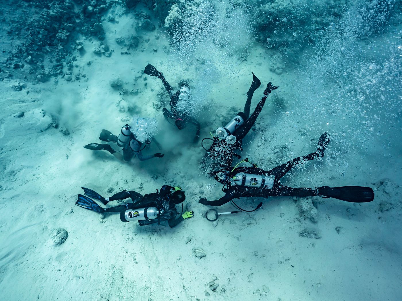 Divers from AllenX examines the debris trail of the Maravillas shipwreck
