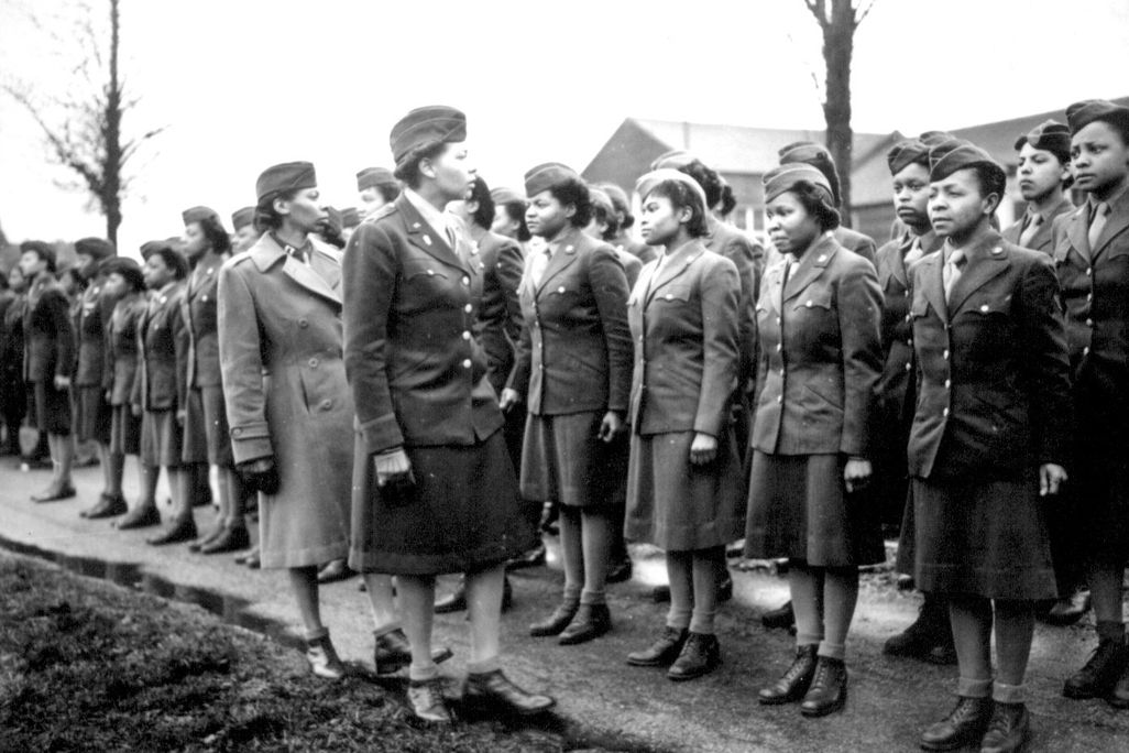 The 6888th Central Postal Directory Battalion stands at attention during an inspection in England in 1945.