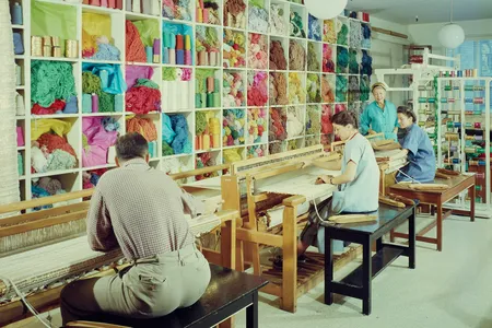 Dorothy Liebes (standing) had two studios in San Francisco before moving her business to New York City.
