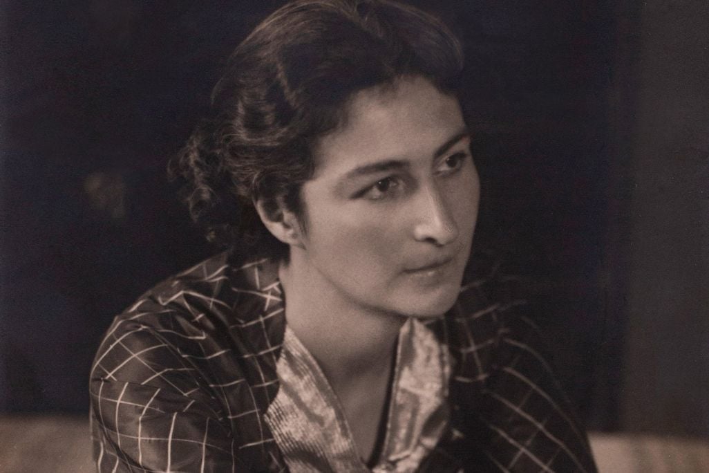 a sepia toned portrait of a woman