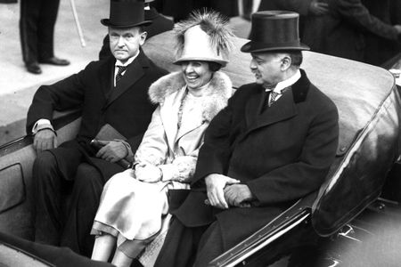 Calvin Coolidge, stoic as ever, with his ebullient wife Grace.