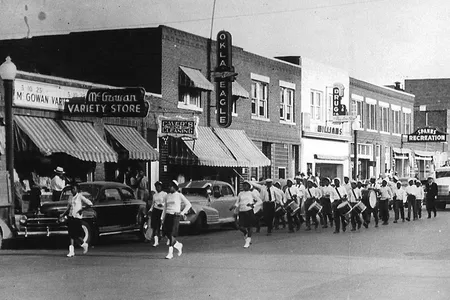 A few short years after the 1921 Tulsa Race Massacre, Greenwood&rsquo;s homes and businesses came back. This photograph shows a parade held in the Oklahoma neighborhood during the 1930s or &#39;40s.