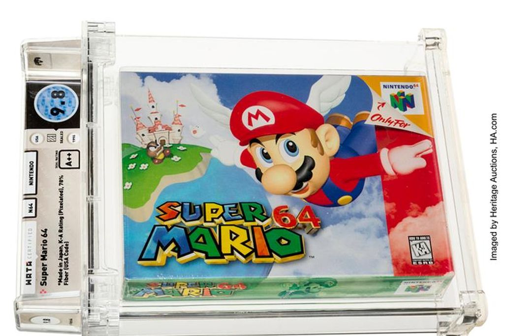 A video game cartridge in original packaging, with SUPER MARIO and Mario falling down from the sky on its front, encased in protective plastic and labeled with its rating