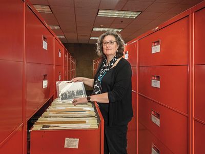 Archivist Patti Williams pulls an item from the more than 1,920 cubic feet of material in the National Air and Space Museum’s Technical Reference Files.