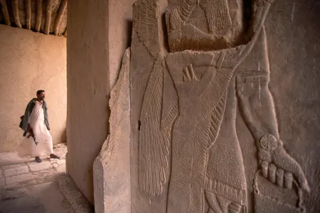 A guard patrolling the ruins of Nimrud in 1995
