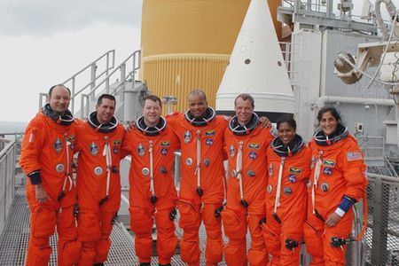 The crew of STS-116 prepares for their December 7 space shuttle launch.