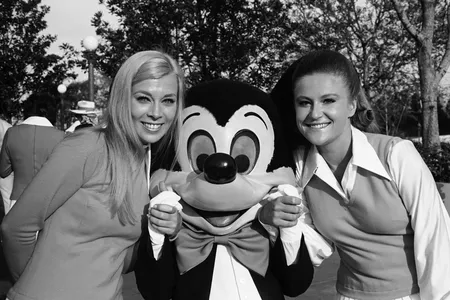 In October 1971, Disney World &quot;cast members&quot; pose with celebrity Mickey Mouse at one of the theme park&#39;s grand opening ceremonies.&nbsp;