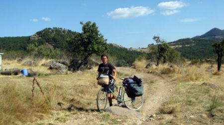 The author runs on empty as he pushes his bike over rough terrain in the Murat Mountains.