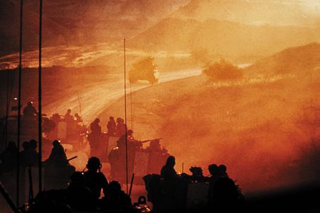 An Israeli armored brigade approaches the Golan Heights to relieve forces under Syrian attack on day two of the 1973 Arab-Israeli War. U.S. fears that the Soviet Union would send troops to assist Egypt and Syria sparked a DEFCON level increase.