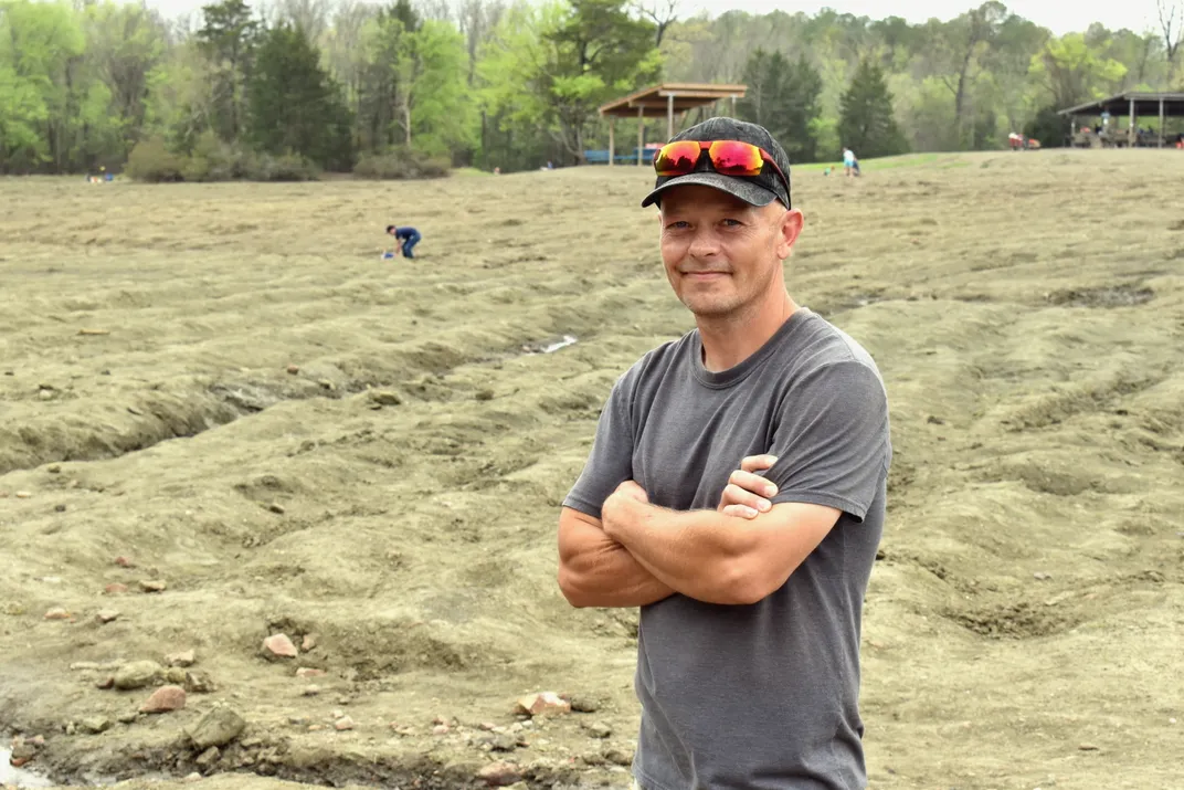 Adam Hardin in a field