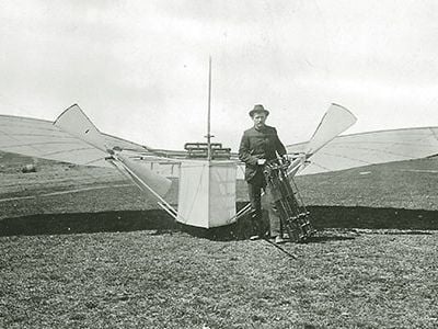 In 1904, Gustave Whitehead was photographed with his 1901 machine — on the ground.