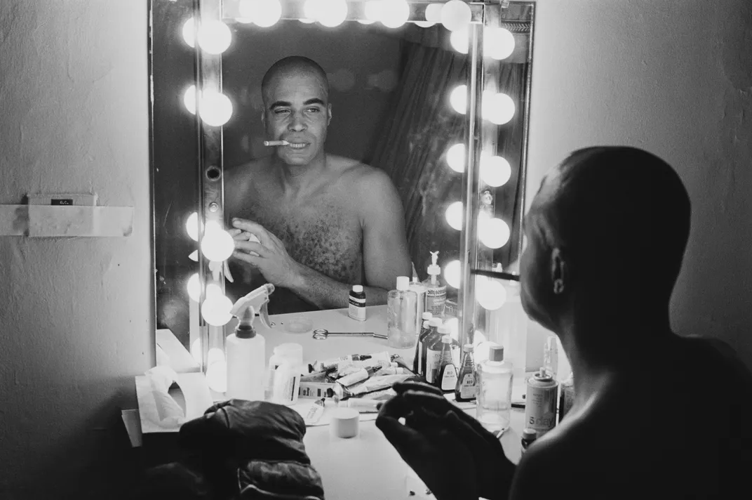 James Earl Jones looks at his reflection in a Broadway dressing room mirror on December 10, 1968