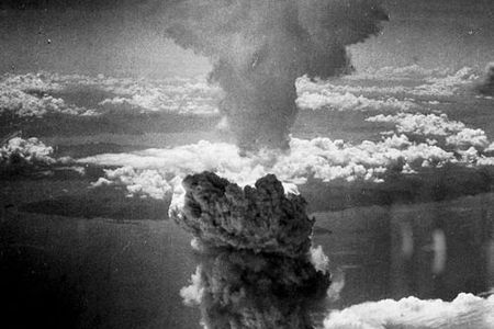 The mushroom cloud produced by the “Fat Man” bomb from the bombing of Nagasaki, Japan.