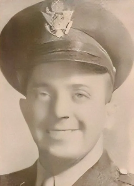 Black and white photo of U.S. soldier wearing a military hat and uniform