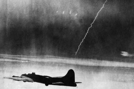 A V-2 streaks by a B-17 at high altitude. Not surprising that we found no similar photo of a B-24.