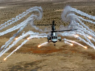 A CH-46E Sea Knight throws out infrared countermeasures during 2009 tests at the White Sands Missile Range in New Mexico.