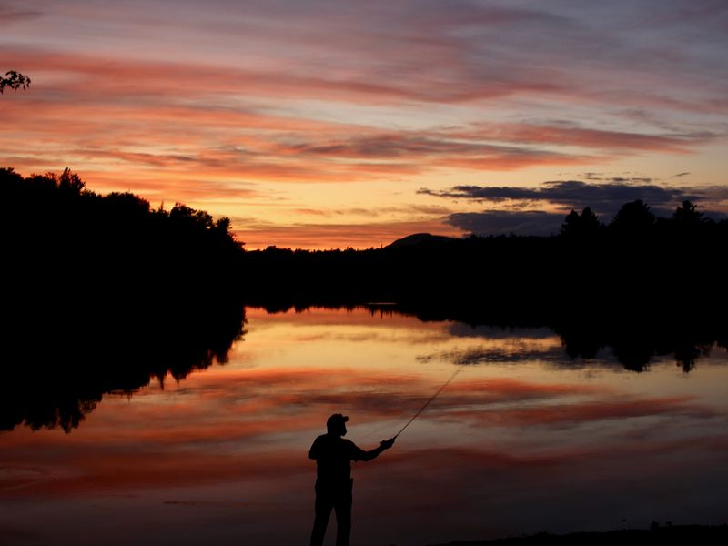 Fly fishing at sunset | Smithsonian Photo Contest | Smithsonian Magazine