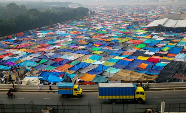 Waves of colorful cloths at the Ijtema ground in the city thumbnail