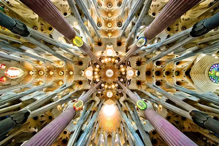 Detail of the roof in the central nave of la Sagrada Familia. The columns are designed to invoke trees and branches.