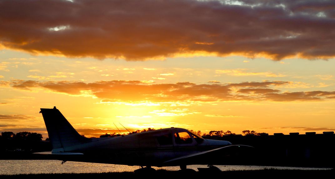 Small engine plane taxing during sunset | Smithsonian Photo Contest ...
