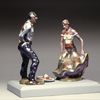 Fiberglass sculpture of a man and a woman at a fiesta.