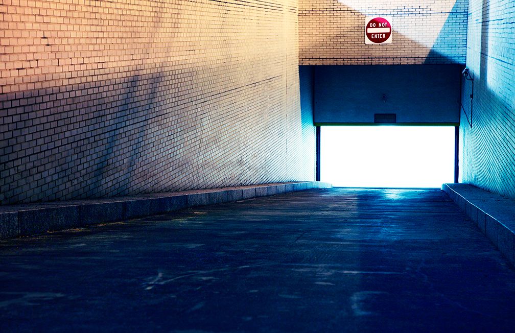 A parking garage structure in Washington, DC radiates artificial light