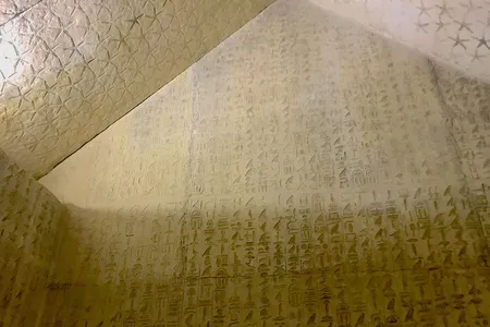 The Pyramid Texts cover walls within the pyramids of King Unis (shown here) and other royals at the site of Saqqara.