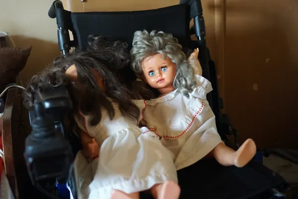 K.'s dolls in wheelchair thumbnail