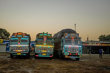Brightly colored trucks are parked near the village of Murthal, a popular stopping place for weary travelers in search of a good meal.