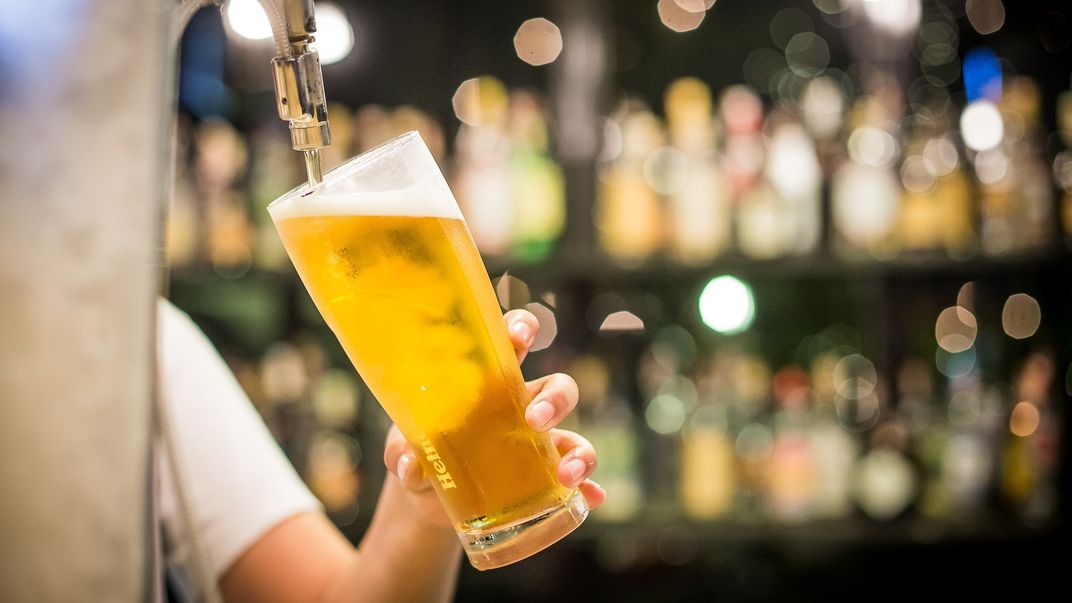 Bartender pouring a beer