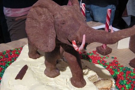 A chocolate model fo the African Bush elephant in the rotunda of the Smithsonian's National Museum of Natural History on top of a festive holiday cake.